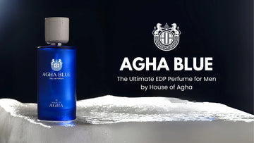 A sleek bottle of Agha Blue EDP by House of Agha against a backdrop of Hyderabad’s Golconda Fort, showcasing luxury and heritage.